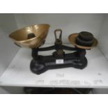 set of cast scales with brass pans