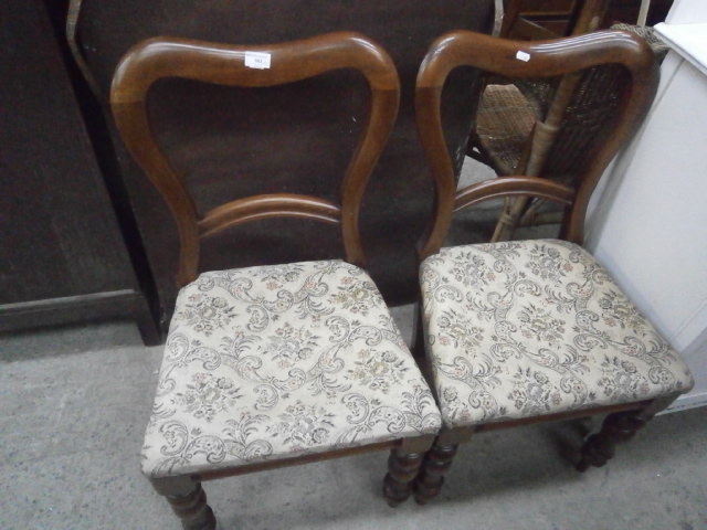 pair of upholstered balloon back chairs