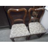 pair of upholstered balloon back chairs