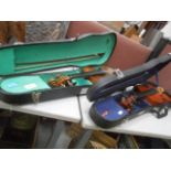 2 violins A / F with bows in cases