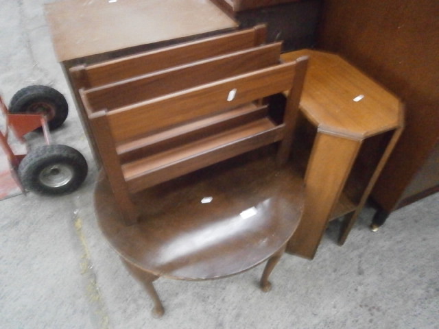 pair of occasional tables and a magazine rack
