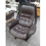 retro leather seated wood framed swivel chair