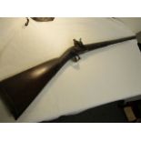 Antique flintlock rifle by Spencer & Grave.