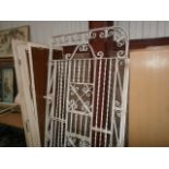 pair of large painted cast iron gates