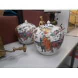 pair of oriental hand painted lidded urns