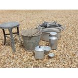 A collection of aluminium dairy bowls and galvanised items including milk stool, jelly moulds and