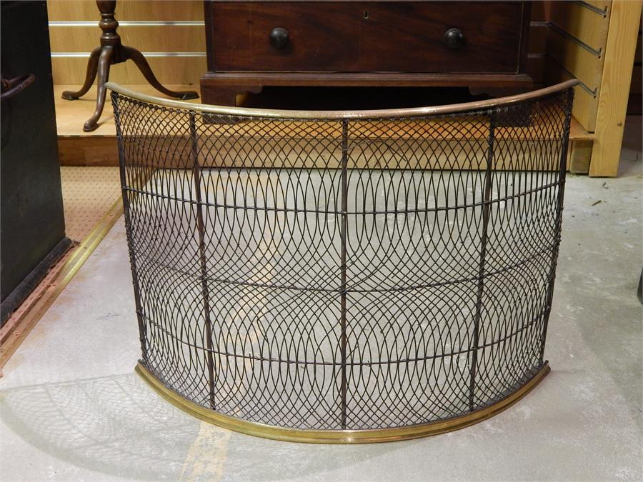 Small Regency Wirework and Brass Curved Fireguard. The height is 47cm and width is 65 the depth is