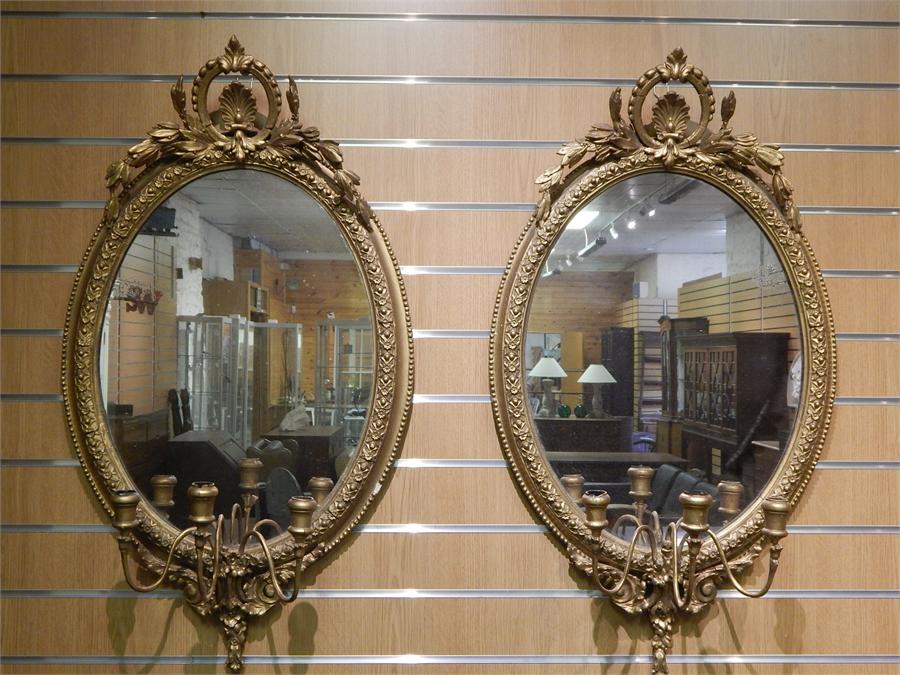 Pair Girandole Mirrors. 54cm wide, 96cm high. Some losses to mouldings. ~