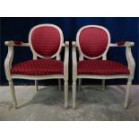 Pair of white Painted open armchairs with red fabric.