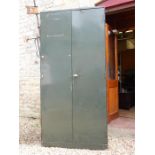 Green painted metal cabinet.