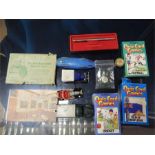 A Mixed lot including Corgi toy - Proteus Campbell Bluebird "153", Dinky Toy and Tucks postcards