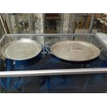 Oval silver plated EPNS twin handled tray along with a round plated tray on claw feet.