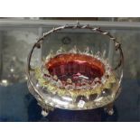 Silver plated and cranberry glass dish.