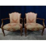 Pair of low French armchairs.
