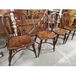 A matching set of four Lincolnshire windsor side chairs , circa 1815 , each signed " WILSON GRANTHAM