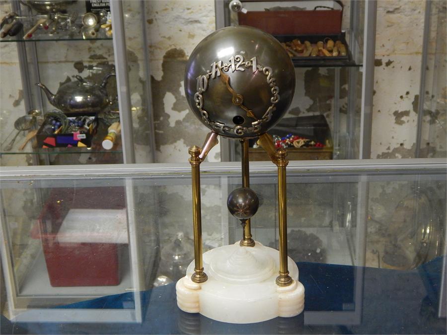 Brass globe clock onyx or marble base. Junghans.