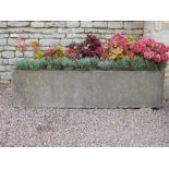 A reconstituted stone trough - first half 20th century. note this is off-site and can be viewed at