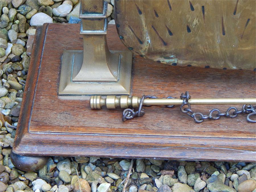 A brass and oak stand with dinner gong mounted on chain. Stamped "The Harmonic" to rear of gong. - Image 4 of 7