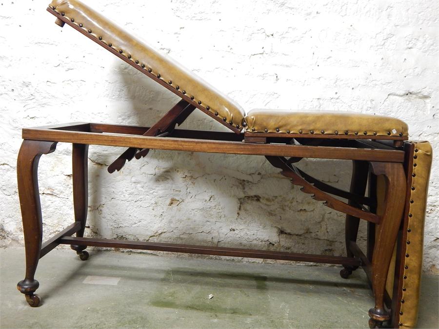 A Doctor's examination bench, late 19th Century, labelled WM Richardson (Furnisher) Ltd. ~