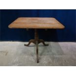 Oak tilt top table.