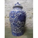 An ovoid Jar and lid in a chinese pattern blue and white, some damage to rim of jar.