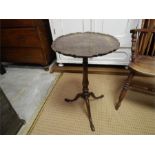 Mahogany tripod table early 18th century - original catch losses to edging ~