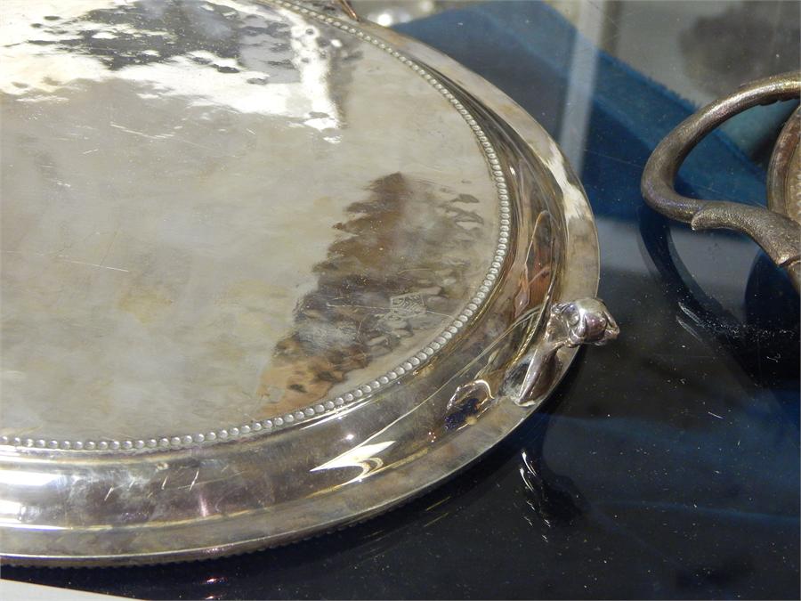 Oval silver plated EPNS twin handled tray along with a round plated tray on claw feet. - Image 6 of 6