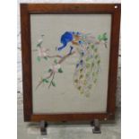Oak fire screen with peacock needlework, dimensions are