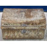 Metal distressed misshapen trunk.