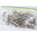 Large quantity of charms some marked silver