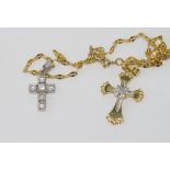 14ct yellow gold chain and cross weight: 6.9 grams, with another 14ct white gold cross weight: