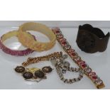 Seven interesting vintage bracelets including micro-mosaic, gold lined, early coloured plastic,