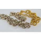 Two heavy gilt metal necklaces one with matching bracelet