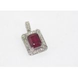 18ct white gold ruby and diamond pendant 31 diamonds, treated ruby 3.78ct, weight: approx 2.8 grams