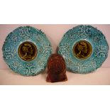 Two majolica plates and Rockingham money box 20cm approx diameter ( plate)