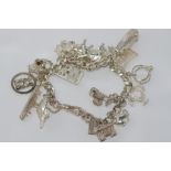 Silver bracelet with world charms with parrot clasp, weight: approx 63 grams