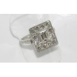 18ct white gold diamond cluster ring with emerald cut centre diamond (1.04ct) VS1 and 12 round