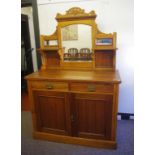 Victorian oak chiffonier with 2 drawers over 2 doors, mirrored top with decorative carved shelves,