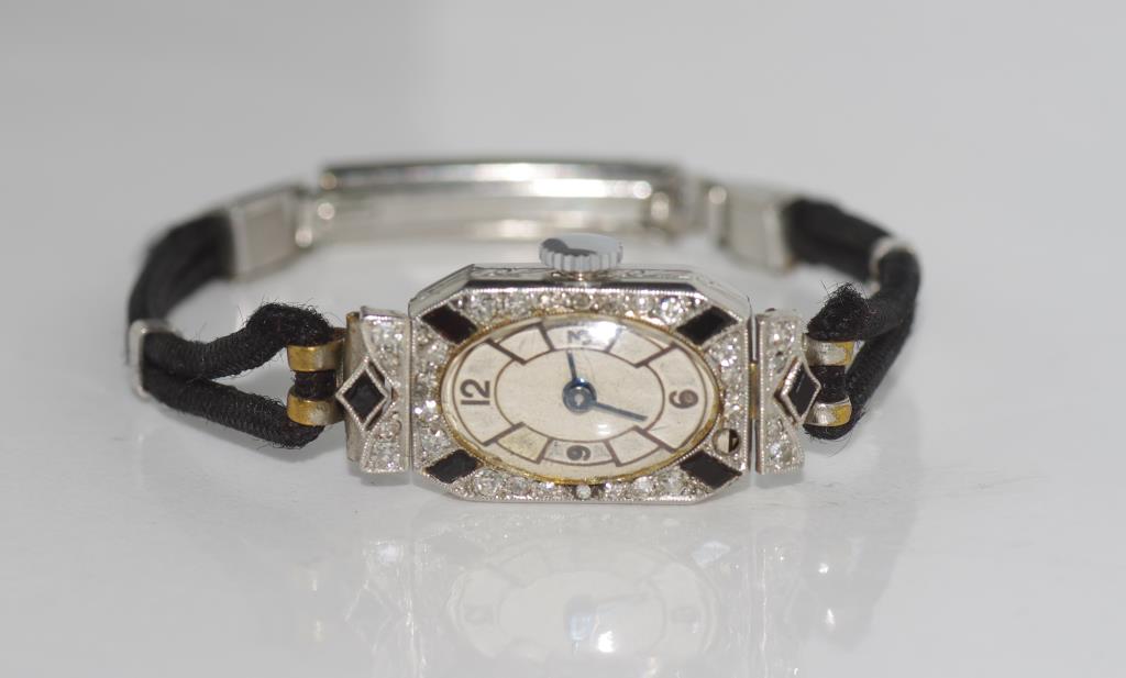 Art Deco diamond platinum and onyx watch