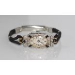 Art Deco diamond platinum and onyx watch