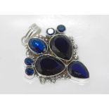 Large sterling silver and blue sapphire pendant