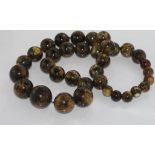 Matinee length mottled Baltic amber necklace "Cookies & Cream" colour, beads from 12mm to 24mm