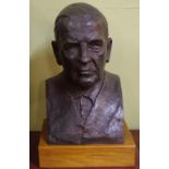 Large bronze sculpture of Sir Robert Menzies set on an oak plinth, H52cm approx