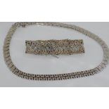 Silver fancy bracelet and necklace