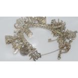 Silver bracelet with world charms weight: approx 85 grams