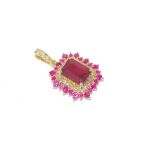 18ct yellow gold and ruby and diamond pendant 2.43ct ruby (treated and natural) and 26 diamond .