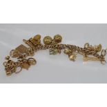 9ct gold bracelet with 29 world charms incl Aust. some marked 375, needs a new clasp, weight: approx