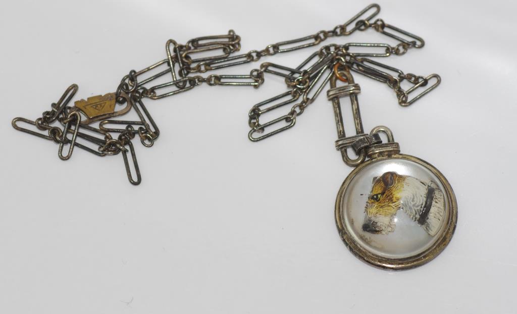 Antique Essex crystal dog pendant set in silver