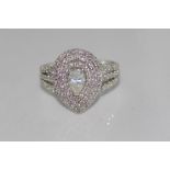 18ct white gold and pear shaped diamond ring Centre diamond pear =0.40cts PK, 121 diamonds TDW=0.