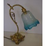 Antique style brass electric lamp with blue etched glass shade, 35cm high approx.